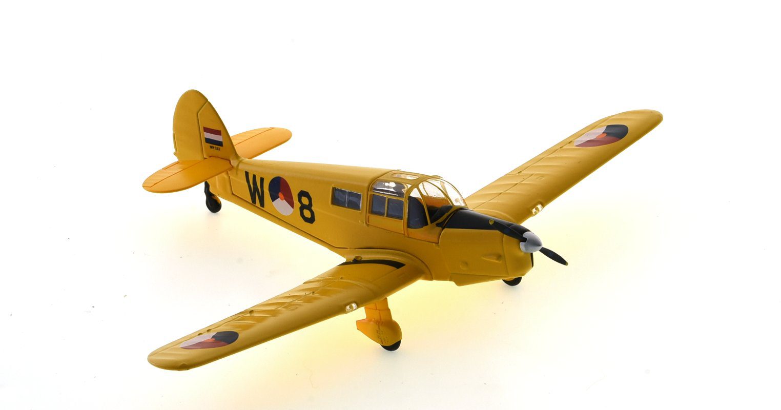Front starboard side view of Oxford Diecast 72PP003 - 1/72 scale diecast model of the Percival P.34 Proctor Mk.IV, s/n W-8, in the overall trainer yellow paint scheme and markings of the KLu