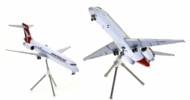 Image of model on display stand, Boeing 717-200 1/200 scale diecast model, registration VH-NXD, QantasLink - Gemini Jets G2QFA539