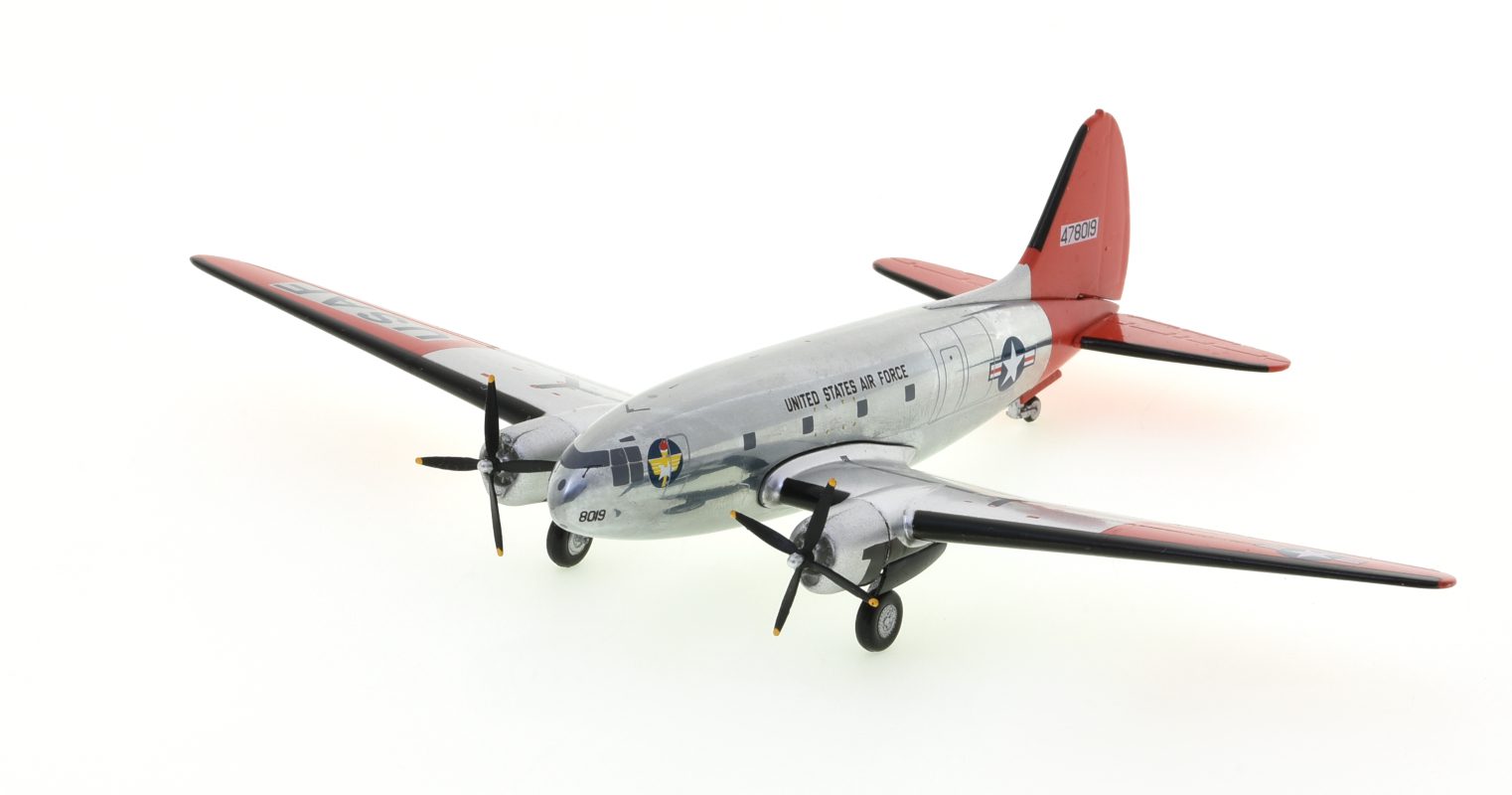 Front port side view of the Curtiss C-46D Commando  1/200 scale diecast model, s/n 44-78019, 3499th Mobil Training Wing, Chanute AFB, circa 1954 - AeroClassics AC219753