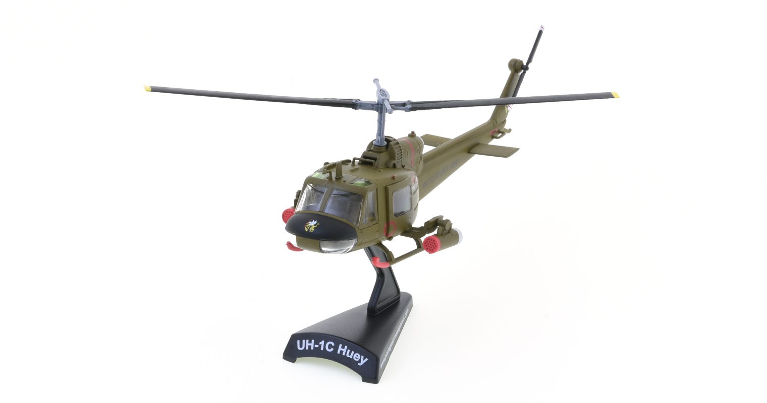 Front port side view of the Bell AH-1C Iroquois 1/100 scale diecast model in the colour scheme of the 1st Cavalry Division, US Army, An Khe, South Vietnam, circa 1966. - Postage Stamp Collection PS5601