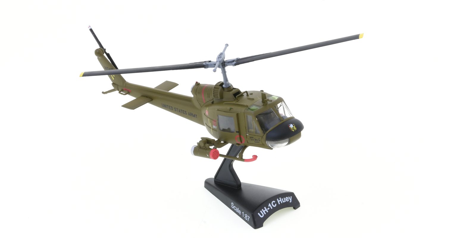 Front starboard side view of the Bell AH-1C Iroquois 1/100 scale diecast model in the colour scheme of the 1st Cavalry Division, US Army, An Khe, South Vietnam, circa 1966. - Postage Stamp Collection PS5601
