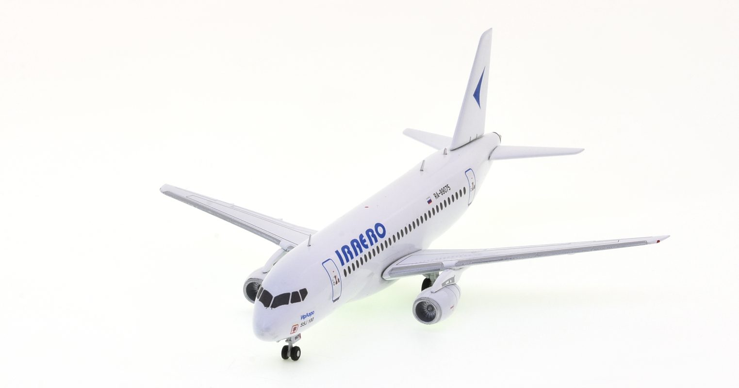 Front port side view of the AviaBoss A2006 - 1/200 scale diecast model Sukhoi Superjet 100 (SSJ100) of registration RA-89077 in the livery of IrAero.