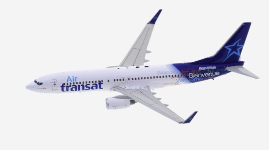 Top view of JFox JF-737-8-027 - 1/200 scale diecast model of the Boeing B737-800 NG, registration C-GTQJ, in the livery of Air Transat.