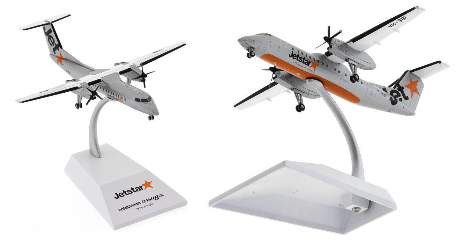 Image showing model on display stand, 1/200 scale De Havilland Canada Dash 8-300 diecast model of  registration VH-SBI, Jetstar livery, circa the late 2000s - JC Wings JC2JST276