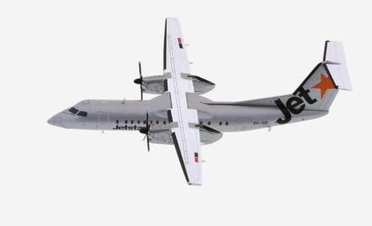 Top view of JC Wings JC2JST276 - 1/200 scale diecast model of the De Havilland Canada Dash 8-300, registration VH-SBI, Jetstar livery, circa the late 2000s
