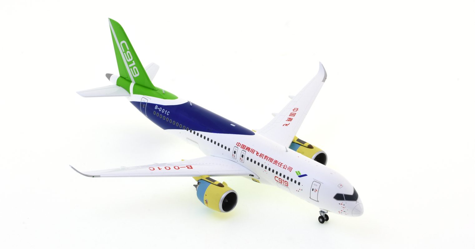Front starboard side view of the 1/200 scale Comac C919 prototype diecast model, registration B-001C in Comac House Colours - JC Wings LH2COM225