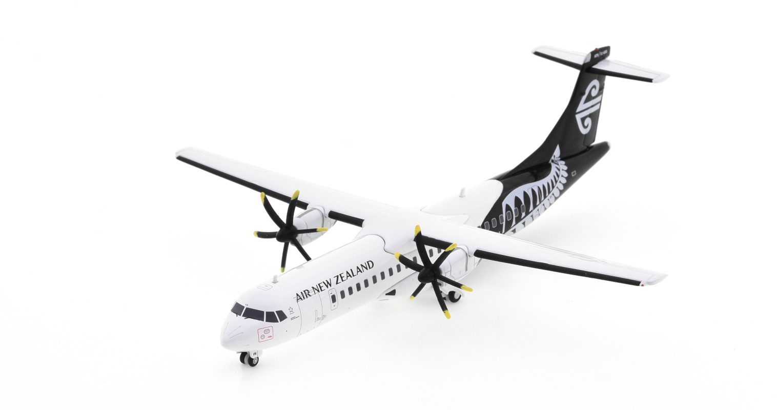 Front port side view of the ATR 72-600 1/200 scale diecast model registration ZK-MVN, in the 