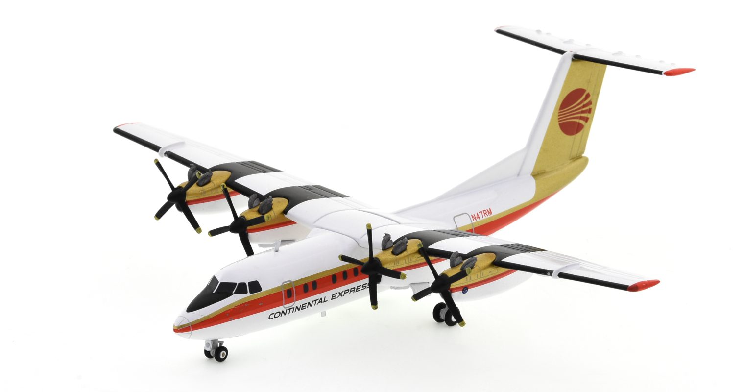Front port side view of the de Havilland Canada DHC-7-102 1/200 scale diecast model, registration N47RM operated by Rocky Mountain Airline in Continental Express's livery, circa the late 1980s - Herpa HE571180