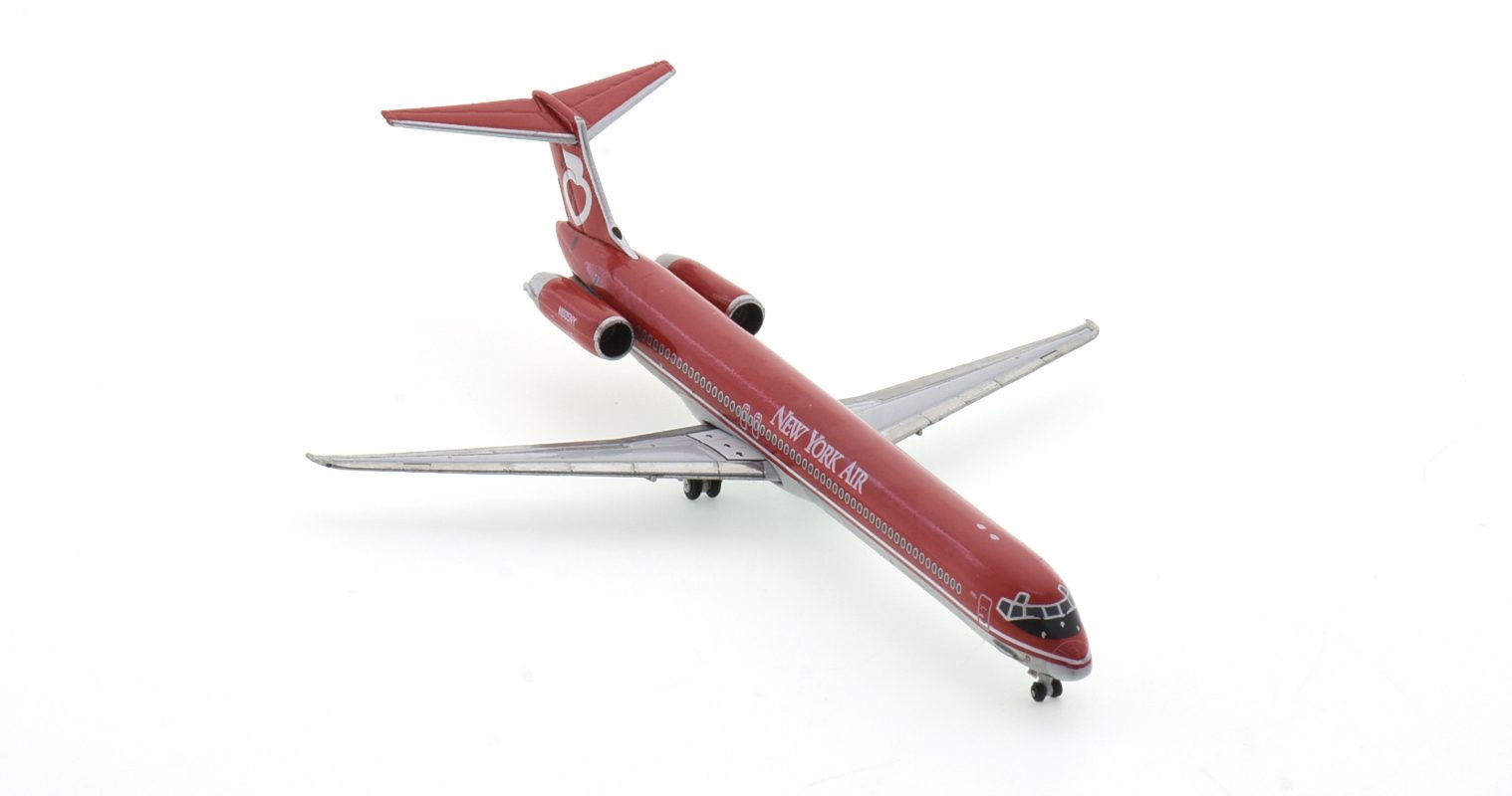 Front starboard side view of Gemini Jets GJNYA1967 - 1/400 scale diecast model of the McDonnell Douglas MD-82, registration N805NY in New York Air's livery the mid-1980s