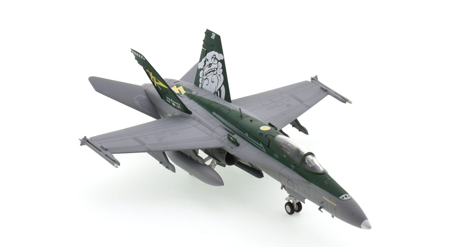 Front starboard side view of Herpa Wings HE580601 - 1/72 scale diecast model McDonnell Douglas F/A-18A Hornet, s/n A21-39, No.77 Sqn, RAAF, squadrons 77th Anniversary, 2019.