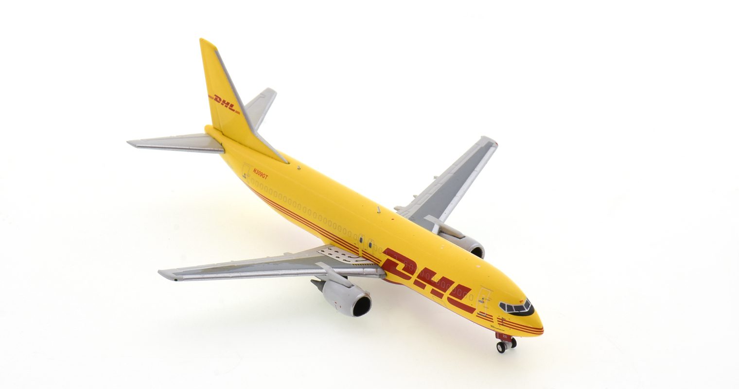 Front starboard side view of Panda Models PM202031 - 1/400 scale diecast model of the Boeing 737-400 SF registration N309GT in DHL Aviation's livery, circa 2020.