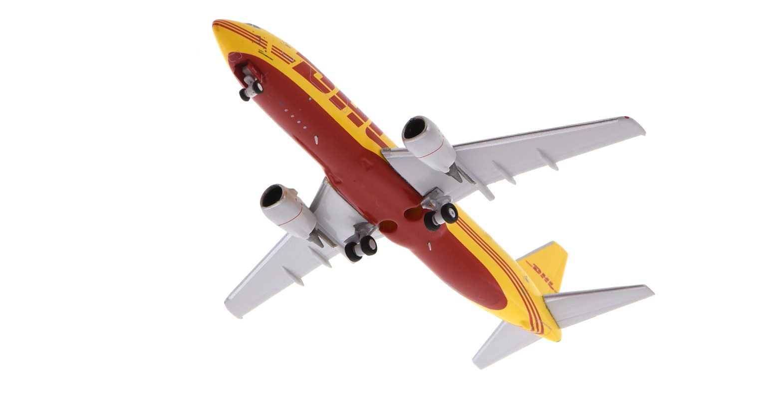 Underside view of Front starboard side view of Panda Models PM202031 - 1/400 scale diecast model of the Boeing 737-400 SF registration N309GT in DHL Aviation's livery, circa 2020.