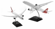 Image of model on display stand, Port side view of Gemini Jets G2QFA983F - 1/200 scale diecast model of the Boeing B787-9 Dreamliner with flaps down, registration VH-ZNK, named "Gangurru", Qantas's "Silver Roo" livery.