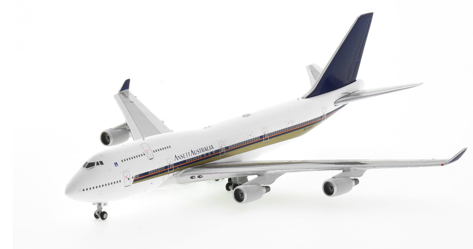 Front port side view of JC Wings EW4744005 - Boeing 747-400 1/400 scale diecast model, registration 9V-SMT, in Singapore Airlines's livery with Ansett Australia tittles.