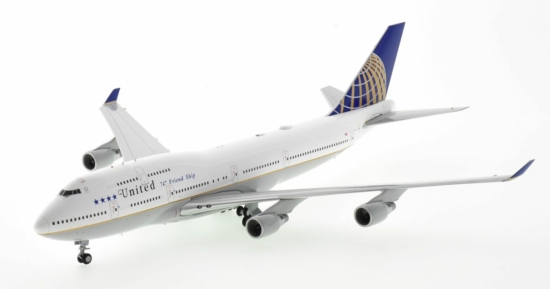 Front port side view of JC Wings JC2UAL203 - Boeing 747-400 1/200 scale diecast model, registration N118UA, in United Airlines final B747 flight livery featuring the airline's iconic "Friend Ship" title.