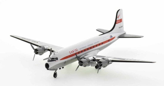 Front port side view of Herpa WingsHE571555 - 1/200 scale diecast model Douglas DC-4, registration VH-EDB, named "Norfolk Trader" in Qantas Airway's livery, circa the 1960s