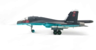 Port side view of the 1/72 scale diecast model of the Sukhoi Su-34 s/n RF-95807, Bort # "Red 26", VVS, Syria, 2015 - Hobby Master HA6302B