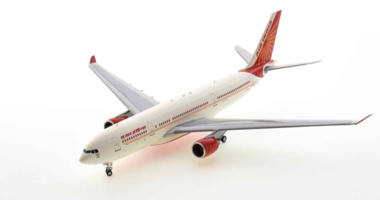 Front port side view of IF332AI1220 - 1/200 scale diecast model Airbus A330-200  of registration VT-IWA in Air India's livery