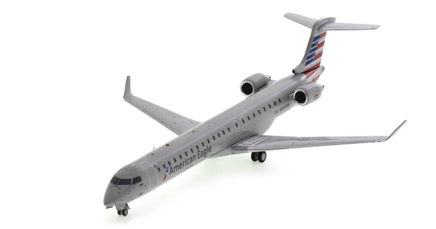 Front port side view of Gemini Jets  G2AAL621 - 1/400 scale diecast model of the Bombardier CRJ900LR registration N584NN in American Eagle's livery