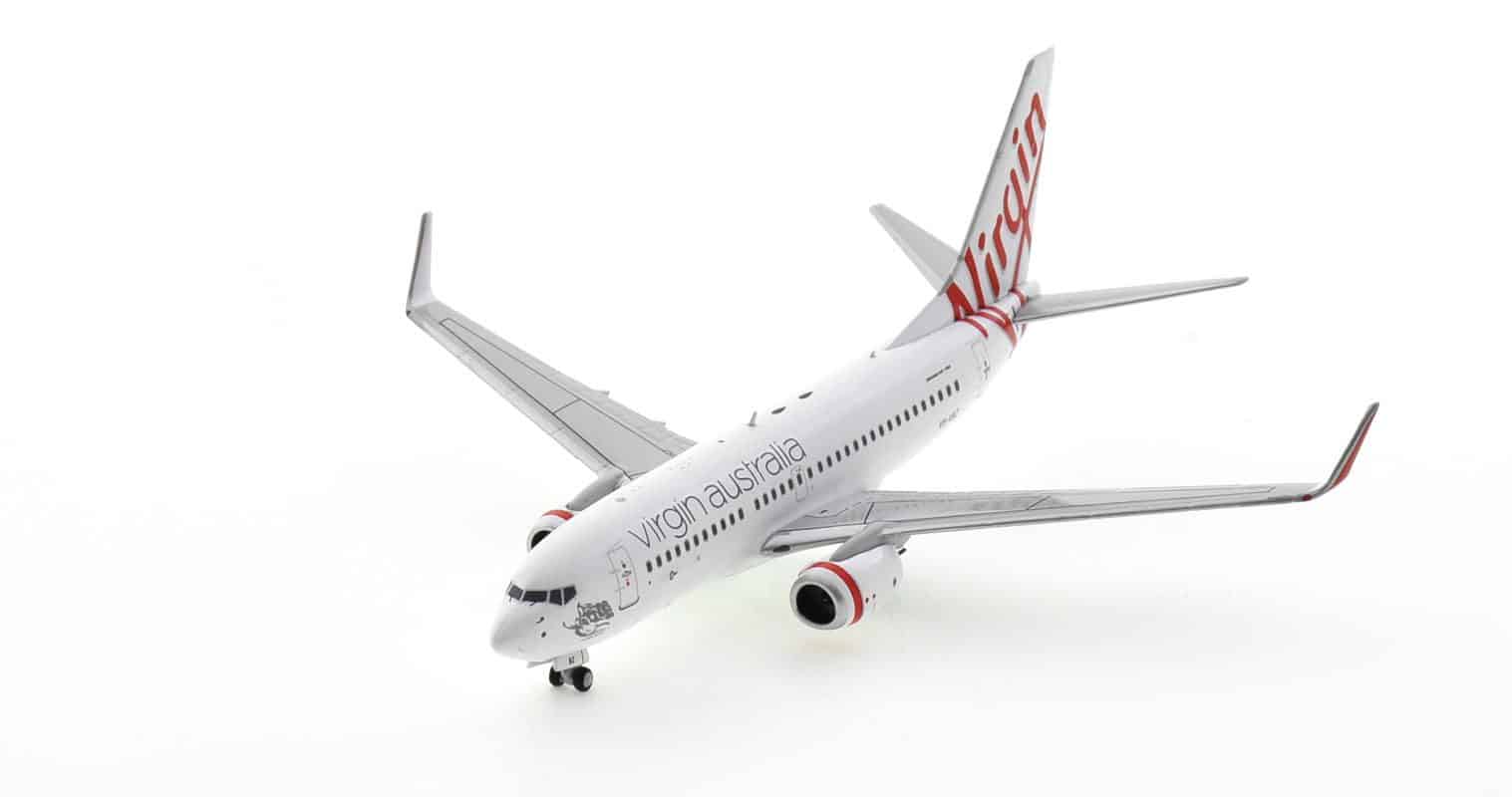 Front port side view of NG77010 - 1/400 scale diecast model Boeing 737-700, named 
