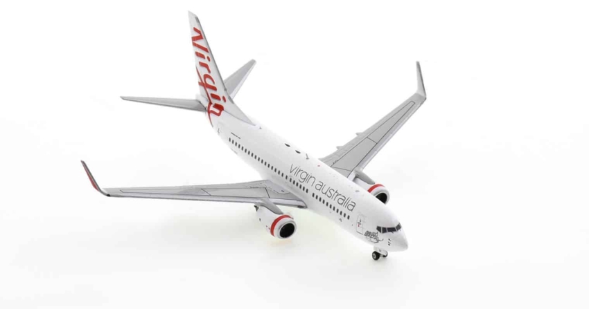 Front starboard side view of NG77010 - 1/400 scale diecast model Boeing 737-700, named "Cronulla Beach", registration VH-VBZ in Virgin Australia Airline's livery.