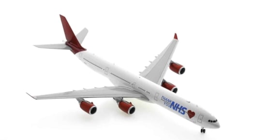 Front starboard side view of JC Wings JC2MLT0097 / XX20097 - 1/200 scale diecast model of the Airbus A340-600, registration 9H-EAL operated by Maleth Aero with the "Thank You NHS" livery