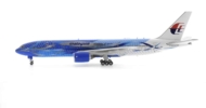 Port side view of JC4MAS485 / XX4485 -  1/400 scale diecast model Boeing 777-300ER of registration 9M-MRD in Malaysia Airlines "Heliconia - Freedom of Space" livery