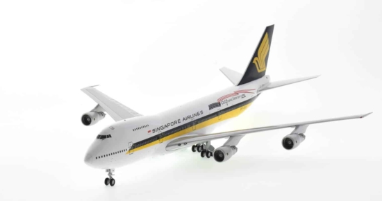 Front port view of JC Wings EW2742001 - Boeing 747-200B 1/200 scale diecast model of registration 9V-SIA in Singapore Airlines livery with "California here we come" titles, circa 1980.