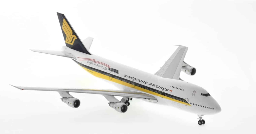 Front starboard view of JC Wings EW2742001 - Boeing 747-200B 1/200 scale diecast model of registration 9V-SIA in Singapore Airlines livery with "California here we come" titles, circa 1980.