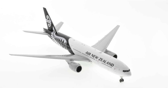Front starboard view of JC Wings JC2ANZ0031 / XX20031 - 1/200 scale diecast model Boeing 777-200ER registration ZK-OKG in Air New Zealand's "Silver Fern" livery.