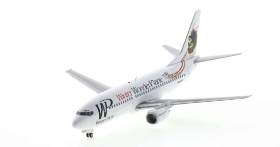 Front port side view of JC Wings JC2KMR0109 / XX20109 - 1/200 scale diecast model Boeing 737-300 registration N962WP in Western Pacific Airlines livery with "Winter Wonder Plane" titles, circa 1996.