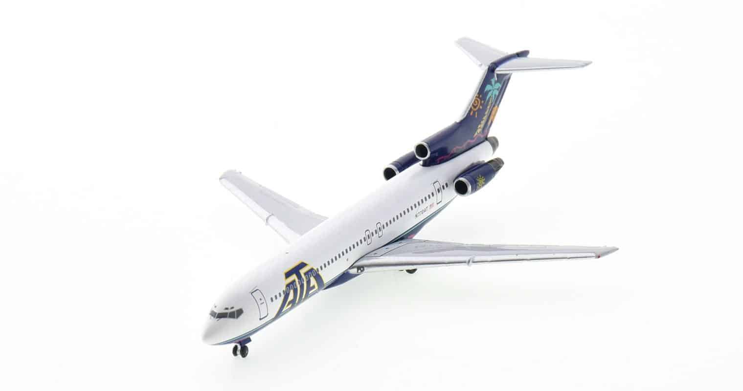 Front port side view of Aero Classics AC411049 - 1/200 scale diecast model Boeing 727-200 registration N770AT in American Trans Air (ATA) livery, circa the late 1990s.