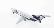 Rear view of Aero Classics AC411049 - 1/200 scale diecast model Boeing 727-200 registration N770AT in American Trans Air (ATA) livery, circa the late 1990s.