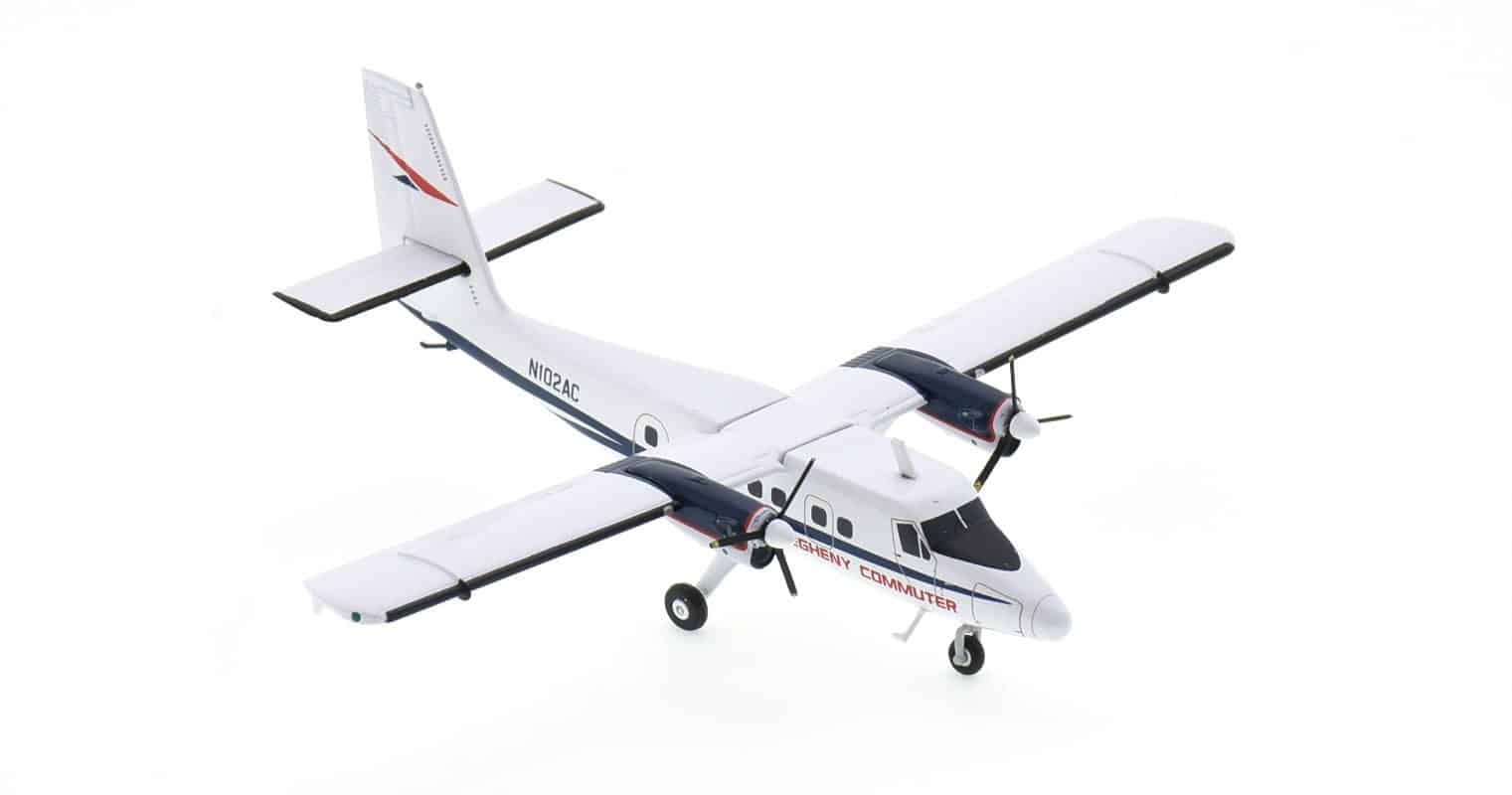 Front starboard side view of Gemini Jets G2USA1033 - 1/200 scale diecast model de Havilland Canada DHC-6-300 Twin Otter, registration N102AC in Allegheny Commuter livery, circa the early 1970s.