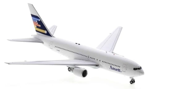 Front starboard side view of Inflight200 IF762AN0122 - 1/200 scale diecast model Boeing 767-200, registration VH-RMD in Ansett Airlines "Southern Cross" livery, circa the 1980s.