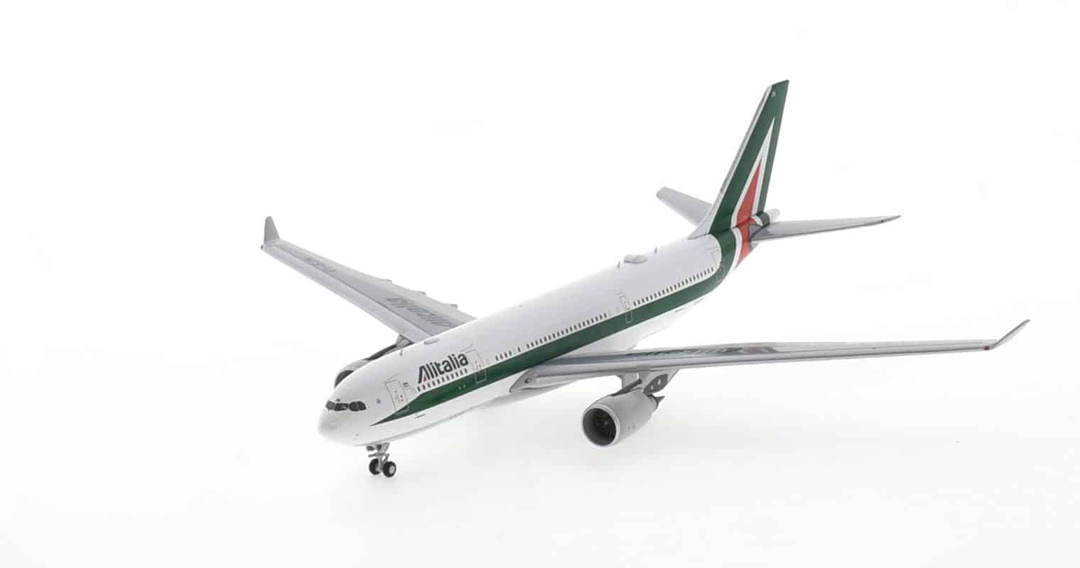 Front port side view of NG Models NG61036 - 1/400 scale diecast model of the Airbus A330-200 registration  EI-EJN, operator ITA Airways, Alitalia livery, circa late 2021.