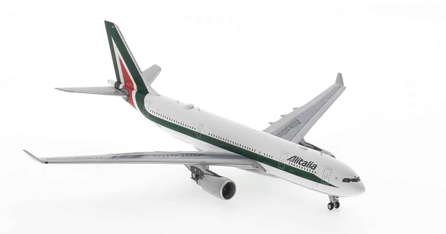 Front starboard side view of NG Models NG61036 - 1/400 scale diecast model of the Airbus A330-200 registration  EI-EJN, operator ITA Airways, Alitalia livery, circa late 2021.