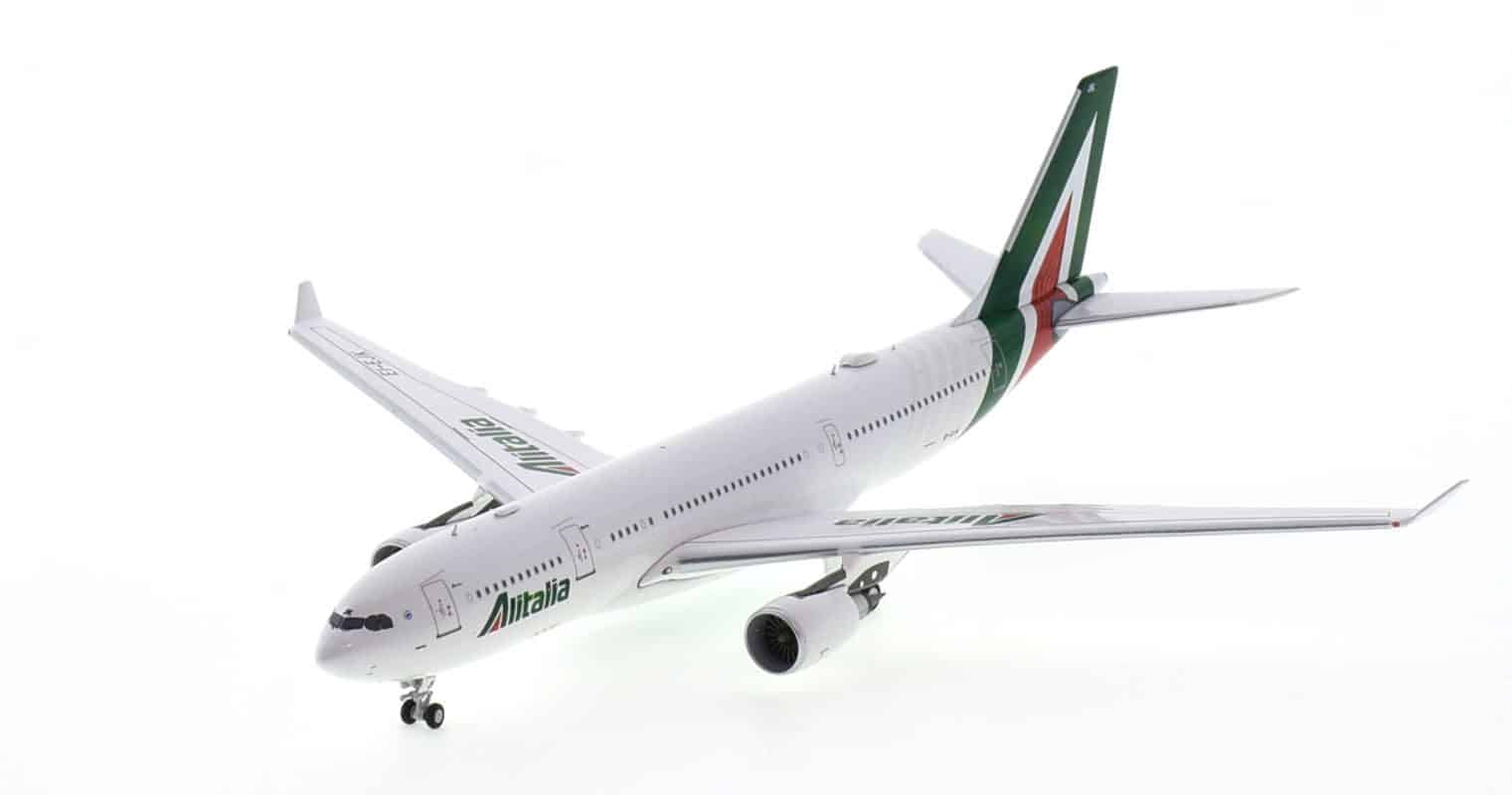 Front port side view of NG Models NG61037 - 1/400 scale diecast model of the Airbus A330-200 registration  EI-EJK, in Alitalia livery.