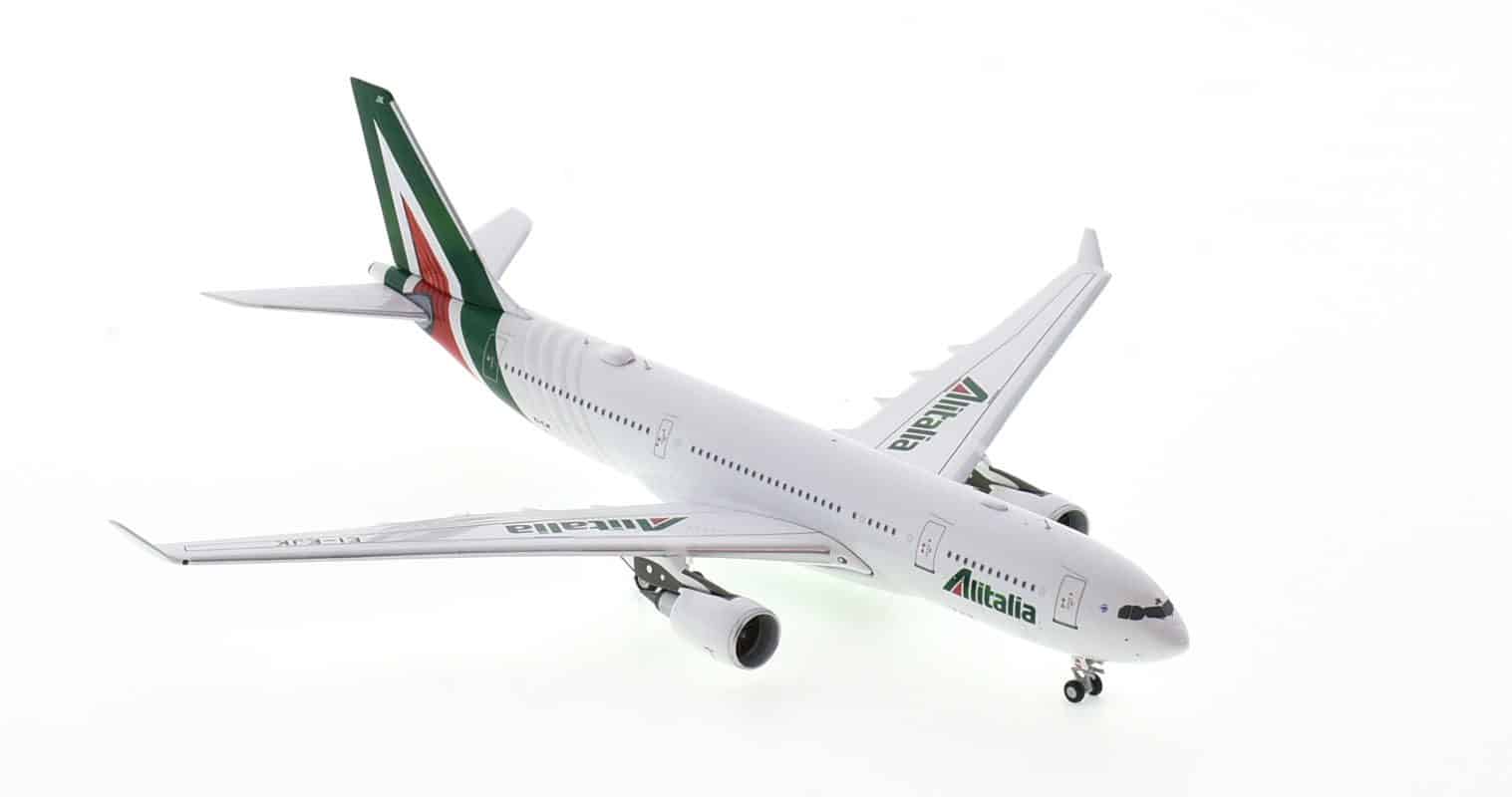 Front starboard side view of NG Models NG61037 - 1/400 scale diecast model of the Airbus A330-200 registration  EI-EJK, in Alitalia livery.