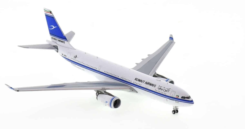 Front starboard side view of NG Models NG61039 - 1/400 scale diecast model of the Airbus A330-200 registration  9K-APA, named "Dasman", in Kuwait Airways livery.