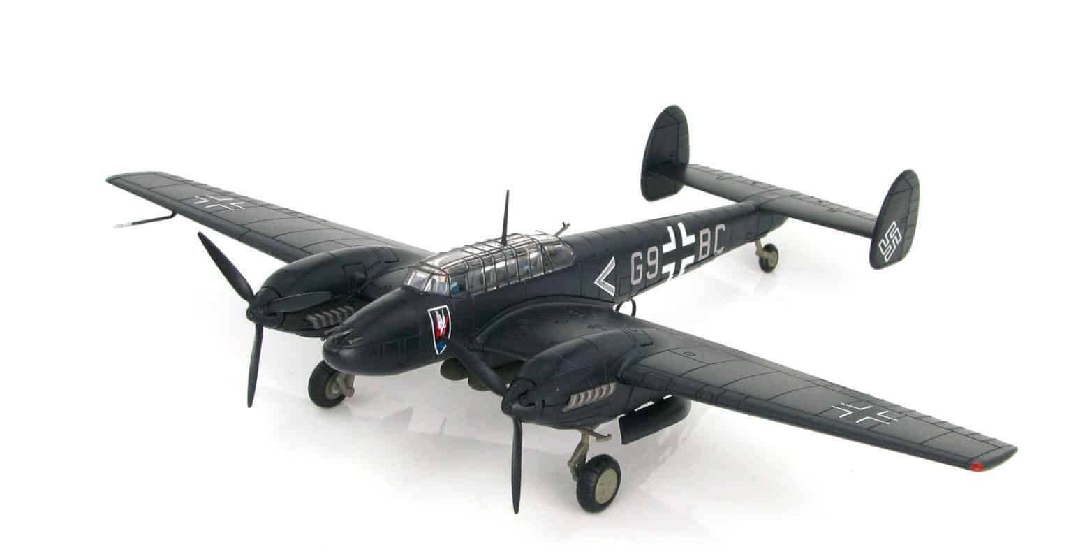 Front port side view of Hobby Master HA1814 - 1/72 scale diecast model Messerschmitt Bf 110E-2 with Geschwaderkennung G9+BC,  Pilot Oblt. Uellenbeck of II./N.JG 1 stationed in St Trond, France during 