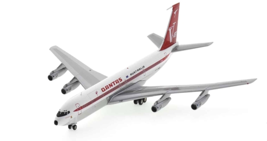 Front port side view of Inflight200 IF707QFAEAIP - 1/200 scale diecast model of the Boeing 707-338C, a B707-320C, named "City Of Darwin", registered  VH-EAI in Qantas " V-Jet" livery, circa 1970.
