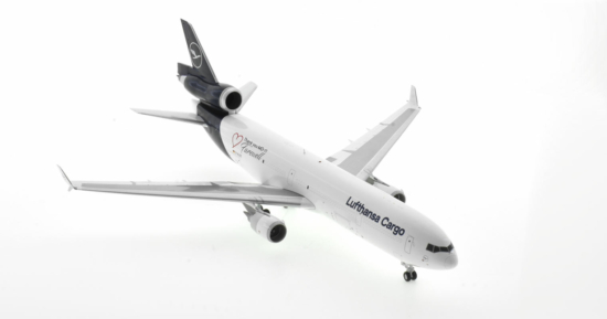 Front starboard side view of the McDonnell Douglas MD-11F 1/200 scale diecast model, registration D-ALCC in Lufthansa Cargo livery with "Farewell MD-11" logo, October 2021 - JC Wings EW2M11001 