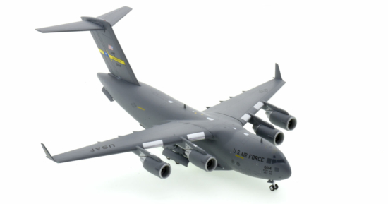 Front starboard side view of the 1/200 scale diecast model Boeing C-17 Globemaster III named "Spirit of the Pelicans" serial 0014 of the 437th Airlift Wing, Air Mobility Command(USAF) and associate, the 315th Airlift Wing, Air Force Reserve Command,  United States Air Force  - Gemini Jets G2AFO635