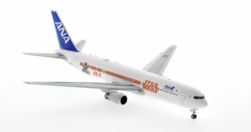 Front starboard side view of the 1/200 scale diecast model B767-300ER, registration JA604A, in All Nippon Airlines's Star Wars "R2-D2" (port side) and "BB-8" (starboard side) livery - JC Wings EW2763005