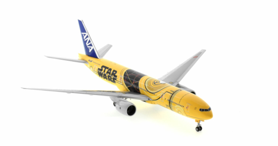 Front starboard side view of the 1/200 scale diecast model Boeing 777-200ER of registration JA743A in All Nippon Airways (ANA) Star Wars "C-3PO" livery - JC Wings EW2772005