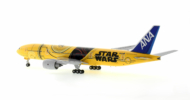 Rear view of the 1/200 scale diecast model Boeing 777-200ER of registration JA743A in All Nippon Airways (ANA) Star Wars "C-3PO" livery - JC Wings EW2772005