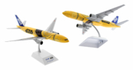 Image of model on display stand, view of the 1/200 scale diecast model Boeing 777-200ER of registration JA743A in All Nippon Airways (ANA) Star Wars "C-3PO" livery - JC Wings EW2772005