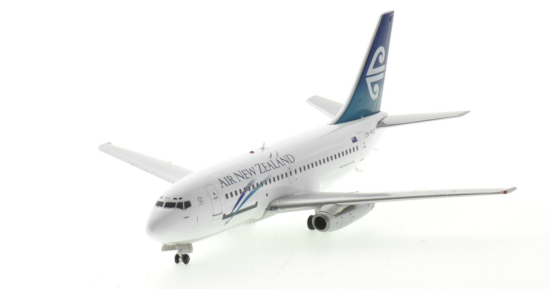 Front port side view of the 1/200 scale diecast model Boeing 737-200 registration ZK-NQC named "Piopio" in Air New Zealand "Pacific Wave" livery, circa 2000 - Inflight200 IF732NZ0922
