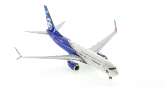 Front starboard side view of the 1/200 scale diecast model Boeing 737-800 NG, registration N570AS, in Alaska Airline's “Honoring Those Who Serve" livery - Gemini Jets G2ASA1138